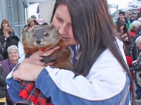 Oil Springs Ollie, the official weather forecaster for the Village of Oil Springs, is with Peggy Jenkins of Heaven's Wildlife Rescue in this 2015 photo. Ollie is set to appear this Feb. 2 at Lambton Centennial School near Petrolia to make this year's prediction. (File photo)