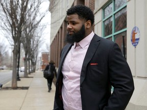 Jets defensive lineman Sheldon Richardson walks out of the St. Charles County Courthouse in St. Charles, Mo., on Tuesday, Jan. 26, 2016, after pleading guilty to reduced charges connected to a recent high-speed police chase. (Jeff Roberson/AP Photo)