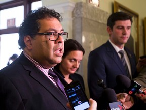 Naheed Nenshi, Mayor of Calgary, Danielle Larivee Minister of Municipal Affairs and Minister of Service Alberta and Don Iveson Mayor of Edmonton speak to the media after meeting with cabinet to talk about city charters on January 26, 2016 at the Alberta Legislature in Edmonton.  (Greg Southam)