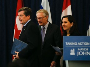 Toronto Mayor John Tory, Senator Art Eggleton and Councillor Ana Bailao deliver the final task force report on TCHC Tuesday, January 26, 2016. (Stan Behal/Toronto Sun)