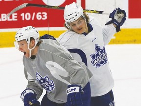 William Nylander (back) and Connor Brown, joking around during an early-season practice for the Marlies, could be linemates for this weekend's games. (VERONICA HENRI, Toronto Sun)