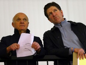 Toronto Maple Leafs GM Lou Lamoriello (left) and head coach Mike Babcock look on during Team Canada practice at the Mastercard Centre in Toronto on Friday December 11, 2015. (Dave Abel/Toronto Sun/Postmedia Network)