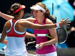 Johanna Konta, right, is congratulated by Zhang Shuai after winning their quarterfinal match at the Australian Open in Melbourne Wednesday, Jan. 27, 2016.(AP Photo/Andrew Brownbill)