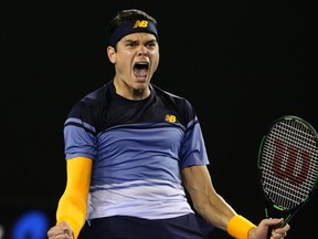 Milos Raonic of Canada celebrates after defeating Gael Monfils of France in their quarterfinal match at the Australian Open in Melbourne, Australia, on Jan. 27, 2016. (AP Photo/Aaron Favila)