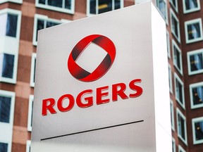 A sign stands in front of Rogers Communications Inc. building on the day of their annual general meeting for shareholders in Toronto, April 21, 2015.    REUTERS/Mark Blinch