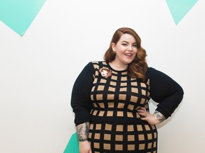In this Jan. 7, 2016 photo provided by Refinery29, plus size model Tess Holliday poses for a photo in New York. The plus-size model and social media phenom who regularly shakes off haters has been reveling in the mainstream since May 2014, when she donned a designer friend's black lace bodysuit to pose for People's 2015 body issue. At 5-foot-5 and size 22, Holliday doesn't fit the ultra-thin fashion model mold. (Tory Rust/Refinery29 via AP)