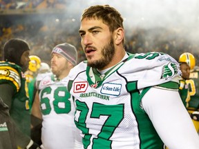 John Chick #97 of the Saskatchewan Roughriders walks on the field after the CFL Western Semi-Final game between the Saskatchewan Roughriders and Edmonton Eskimos at Commonwealth Stadium on November 16, 2014 in Edmonton, Alberta, Canada.   Brent Just/Getty Images/AFP