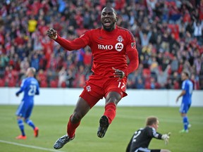 Toronto FC forward Jozy Altidore (17) celebrates after scoring against Montreal Impact in the first half of an Amway Canadian Championship game at BMO Field. Dan Hamilton-USA TODAY Sports