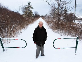 Lambton Wildlife member Peter Banks is pictured here along the Howard Watson Nature Trail near Mandaumin Road in Bright's Grove Wednesday. The retired Imperial Oil engineer drummed up public support for the creation of the 16-kilometre trail in the 1980s. He's one of 16 individuals and groups being recognized with a Mayor's Honour List award Thursday night. Barbara Simpson/Sarnia Observer/Postmedia Network