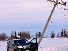 At just after 8 a.m. Wednesday, Jan. 27, the driver of a mini-van lost control on a stretch of icy road on Line 36 west of Mitchell and knocked over a hydro pole, cutting off power to much of Mitchell. GALEN SIMMONS/MITCHELL ADVOCATE