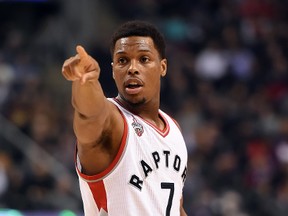 Toronto Raptors guard Kyle Lowry gestures as he speaks to a teammate in the first quarter against Washington Wizards at Air Canada Centre in Toronto on Jan. 26, 2016. (Dan Hamilton/USA TODAY Sports)