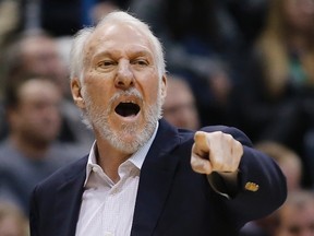 In this Jan. 4, 2016, file photo, San Antonio Spurs coach Gregg Popovich reacts to a call during the first half of the team's NBA basketball game against the Milwaukee Bucks in Milwaukee. (AP Photo/Morry Gash, file)