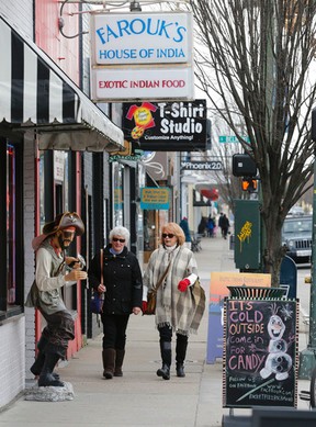 In this Jan. 20, 2016 photo, patrons enjoy lunch at Can Can Brasserie in  Carytown, a few miles west of downtown Richmond, Va. Restaurants offer a  range of ethnic cuisine and clothing
