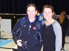 From left, Olympians Becky Kellar and Cheryl Pounder taught a group of local girls on- and off-ice hockey skills, along with some life lessons, at Hillside School on Wednesday, Jan. 27, 2016 in Kettle Point, Ont. The pair have won multiple Olympic and world championships with Canada's women's hockey program. (Terry Bridge, The Observer)