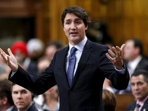 Canada's Prime Minister Justin Trudeau speaks during Question Period in the House of Commons on Parliament Hill in Ottawa, Canada, in this January 25, 2016 file photo.  Trideau pledged on Tuesday to require that environmental reviews of proposed oil pipelines consider greenhouse gas effects, and said it was not his role to be a cheerleader for such projects.  REUTERS/Chris Wattie/Files