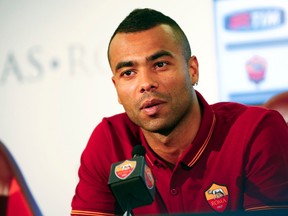 AS Roma's new player Ashley Cole attends a news conference for his presentation at the team's training centre in Rome July 15, 2014. Former England defender Ashley Cole signed a two-year deal with AS Roma after leaving Chelsea at the end of last season.  REUTERS/Tony Gentile
