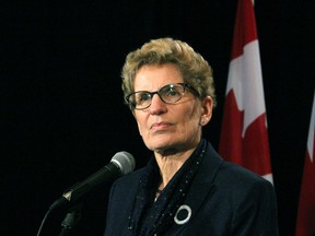 Premier Kathleen Wynne addresses the media following a speech to Whitby-Oshawa Chamber of Commerce Jan. 19, 2016. (Antonella Artuso/Toronto Sun)