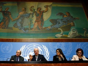 U.N. mediator for Syria Staffan de Mistura (2L) and his staff attend a news conference at the United Nations in Geneva, Switzerland January 25, 2016. REUTERS/Denis Balibouse