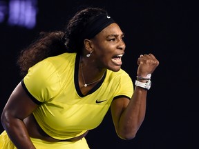 Serena Williams celebrates after winning a point against Agnieszka Radwanska during their semifinal match at the Australian Open in Melbourne Thursday, Jan. 28, 2016.(AP Photo/Andrew Brownbill)