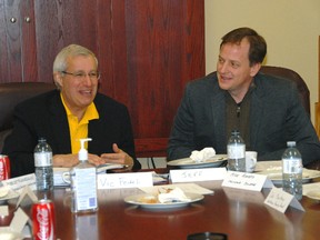 Ontario PC finance critic Vic Fedeli, left, and Elgin-Middlesex-London MPP Jeff Yurek lead a round table discussion with members of the St. Thomas and District Chamber of Commerce Wednesday afternoon.