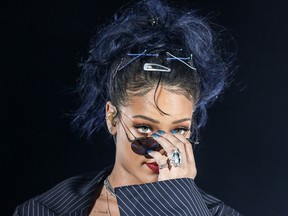 In this Oct. 24, 2015, file photo, Rihanna performs at the We Can Survive Concert at the Hollywood Bowl in Los Angeles. (Photo by Rich Fury/Invision/AP, File)