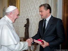Pope Francis meets with actor Leonardo DiCaprio during a private audience in the pontiff's private studio, at the Vatican, Thursday, Jan. 28, 2016. (L'Osservatore Romano/Pool Photo via AP)