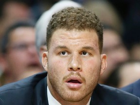 An altercation between the Clippers' Blake Griffin and team staff member Matias Testi in Toronto over the weekend left Griffin with a broken hand that will sideline him 4-6 weeks. (Danny Moloshok/AP Photo/File)