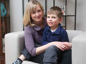 Stephanie Millius and her son Brendan, who just turned 5, and has nine teachers and early childhood educators in his kindergarten class. JEAN LEVAC / POSTMEDIA NETWORK
