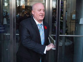 NHL deputy commissioner Bill Daly leaves an NHL general managers' meeting in Toronto on Nov. 12, 2013. (THE CANADIAN PRESS/Mark Blinch)