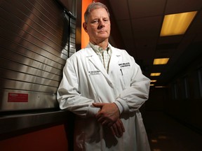 Infectious diseases specialist Dr. Dick Zoutman stands outside the laboratory at Belleville General Hospital in Belleville. He's among the experts advising women who are pregnant or considering it to use caution when travelling to countries where Zika virus is found. (Luke Hendry/Postmedia Network)