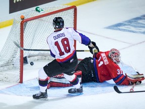 Team Orr’s Pierre-Luc Dubois, left, scores what proved to be the winning goal against Team Cherry goalie Zach Sawchenko in the CHL/NHL Top Prospects Game Thursday in Vancouver. (THE CANADIAN PRESS/Darryl Dyck)