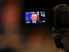 Dave Mowat, Chair of the Alberta Royalty Review Advisory Panel, addresses the media before the official announcement on the panel's findings in Calgary Friday January 29, 2016. (Ted Rhodes/Postmedia)