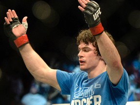 Montreal's Olivier Aubin-Mercier faces Diego Ferreira, a third-degree black belt in Brazilian jiu-jitsu on Saturday in Newark, N.J. (Eric Bolte/USA TODAY Sports)