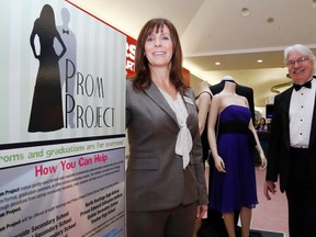 Luke Hendry/The Intelligencer
Maribeth deSnoo and Geoff Cudmore of the Hastings and Prince Edward Learning Foundation stand at the foundation's Prom Project display at the Quinte Mall. The project provides formal wear to students attending Grade 8 and Grade 12 graduations and Grade 12 proms.