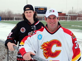 From left, Brock Perry and Jeff Perry are pictured at Norm Perry Park on Thursday January 21, 2016 in Sarnia, Ont. Both descendents of the legendary football figure Norm Perry, Jeff played pro hockey with the Calgary Flames' organization and now his 18-year-old son, Brock, is the latest member to carry on the family's sports legacy as a forward with the Sarnia Legionnaires. Terry Bridge/Sarnia Observer/Postmedia Network