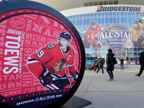 Chicago Blackhawks captain Jonathan Toews, bottom left, is featured on a display outside Bridgestone Arena in Nashville, home of the NHL All-Star Game, on Jan. 28, 2016. (AP Photo/Mark Humphrey)