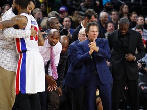 Pistons owner Tom Gores claps his hands as the fourth quarter comes to an end against the Warriors at The Palace of Auburn Hills in Auburn Hills, Mich., on Jan. 16, 2016. Gores announced Friday the first grants from a $10 million campaign to address the public health water crisis in Flint, Mich. (Raj Mehta/USA TODAY Sports)