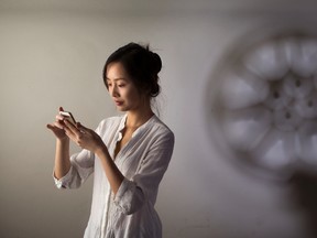 Western University student Jin Shi organized the Smartphone Film Festival for post-secondary students. Each entrant had two weeks to produce a five-minute film using their smartphone. After professional judging, 10 top entries will be screened on Saturday. (DEREK RUTTAN, The London Free Press)