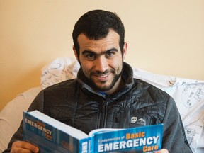 Omar Khadr, having enjoyed eight months of freedom, is studying for his EMR exam which he writes next weekend.