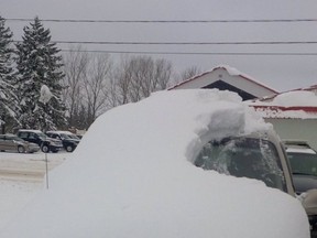 This is a photo taken by the OPP after they stopped a man for the amount of snow on his windshield. The police posted the image on their Twitter website.(Courtesy of the OPP's Twitter page)