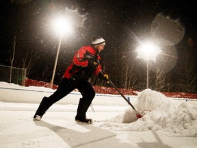 Gino Donato/Sudbury Star
Rink supervisor Marc Gagnon shovels the ice surface at the East End playground rink in this file photo.