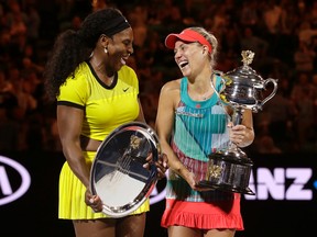 Angelique Kerber, right, of Germany enjoys a joke with runner-up Serena Williams of the United States after winning their women's singles final at the Australian Open tennis championships in Melbourne, Australia, Saturday, Jan. 30, 2016.(AP Photo/Aaron Favila)