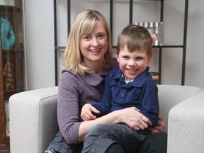 Stephanie Millius and her son Brendan, who just turned 5, and has nine teachers and early childhood educators in his kindergarten class. (Jean Levac/Postmedia)