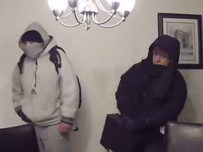 Security camera image of two men wanted in home invasion/Robbery investigation (Toronto Police handout photo)