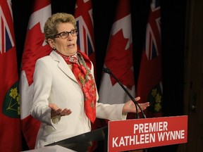 Premier Kathleen Wynne failed to keep her promise to reduce auto insurance rates by an average of 15%. (Antonella Artuso/Toronto Sun/Postmedia Network)