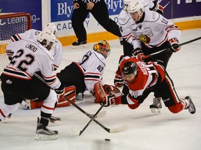 Ottawa 67’s winger Jeremiah Addison falls while chasing the puck yesterday against the Owen Sound Attack at TD Place. (James Park/postmedia network)