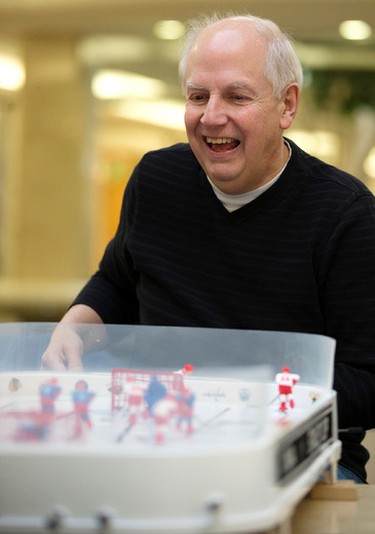 Doug Maas takes part in the during the Alberta Stiga Table Hockey Championships at West Edmonton Mall, in Edmonton Alta. on Saturday Jan. 30, 2016. Photo by David Bloom