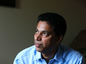 Vince Leitao holds his book, “Jonathan, do you know me?”, which was written after the death of his son to cancer. (Michael Peake/Toronto Sun)