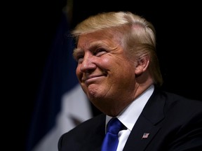 Donald Trump waits to speak at a campaign town hall in Davenport, Iowa January 30, 2016. (REUTERS/Rick Wilking)