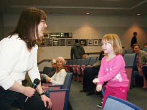 Guelph-based author Jo Ellen Bogart interacts with Paige Allen, 3, of Ingersoll during a session at Woodstock's annual Family Literacy Day at St. Mary's High School on Saturday. Between 600 and 700 people turned out to the event that featured local celebrity readers, crafts, dance demonstrations and St. John Ambulance therapy dogs. JOHN TAPLEY/SENTINEL-REVIEW